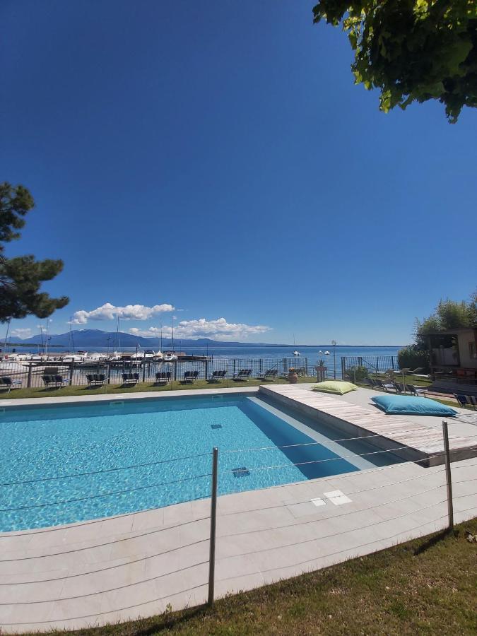 Villaggio Turistico Dei Tigli Паденге-суль-Гарда Экстерьер фото